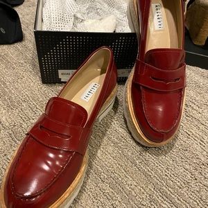 Red patent leather women’s loafers